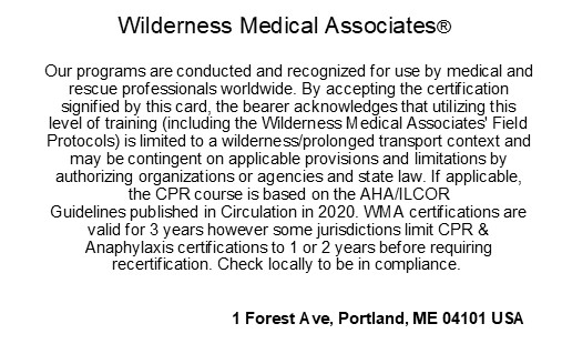 Reverse of the Wilderness Medical Associates certification card, showing programme terms and validity