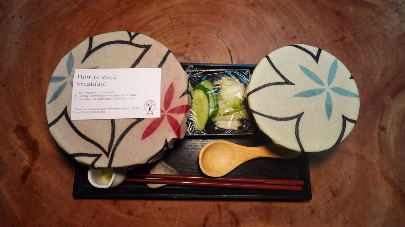 Kashiwaya's self-serve breakfast tray with beeswax-wrapped bowls and instructions